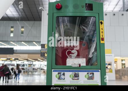 Defibrillator on public hall airport with blurry background Stock Photo