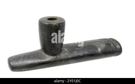 Pipe bowl of the North American Indians made of dark soapstone painted on white Stock Photo