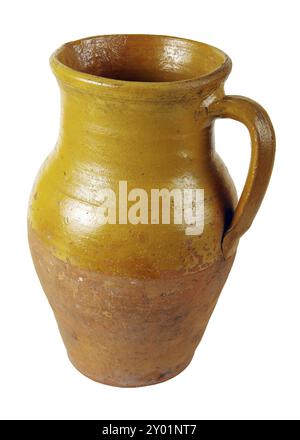 Clay pot of manual work. It is possible to store milk or other liquid Stock Photo