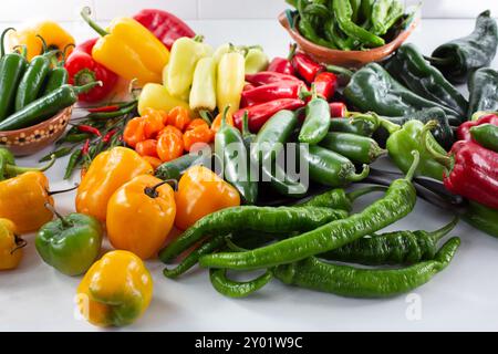 A view of a variety of chili peppers. Stock Photo