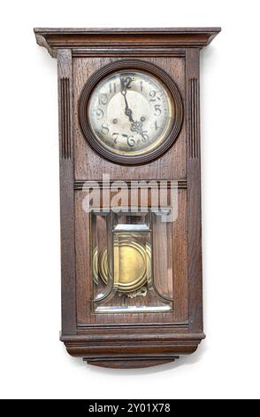 Antique old wooden handmade wall clocks Macro Detail shot hanging on white  with clipping path Stock Photo