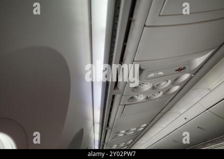 Air Vent in Flight or airplane over passenger seat. Stock Photo
