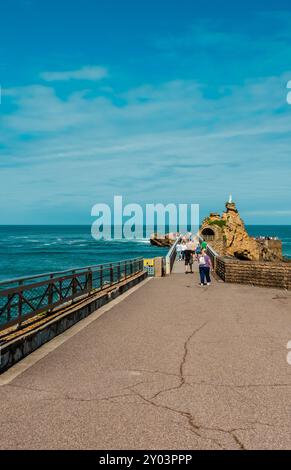 Tourists at the  Virgin Rock in Biarritz, France Stock Photo