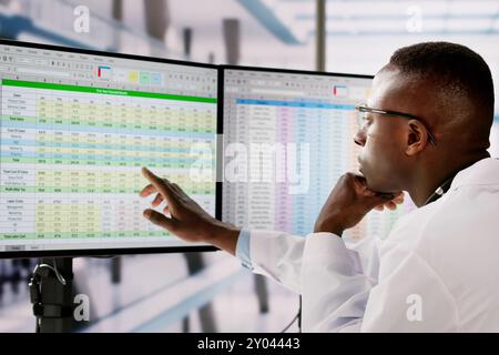 Sad Man Doctor Stress And Pain At Computer Stock Photo