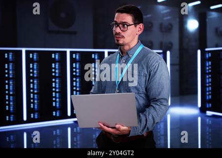 Analyst Engineer In Cloud Data Center Using Computer Stock Photo