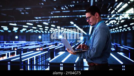 Analyst Engineer In Cloud Data Center Using Computer Stock Photo