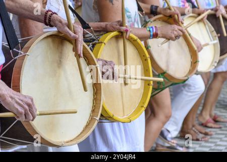 Womans percussionists playing drums during folk samba performance on Belo Horizonte, Minas Gerais Stock Photo