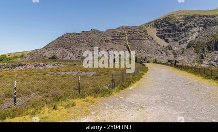 Walking in the derelict Dinorwic Quarry near Llanberis, Gwynedd, Wales, UK Stock Photo