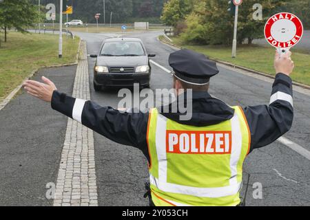 Police check on the road Stop and search operation Stock Photo