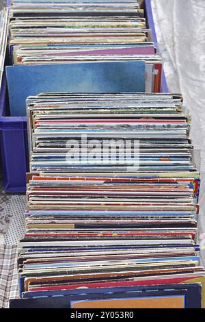 Stacked second hand vinyl records at flea market Stock Photo