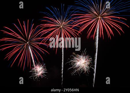 Colorful Fireworks Display against Black Sky Stock Photo
