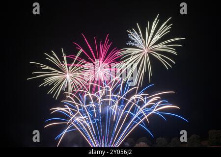 Colorful Fireworks Display against Black Sky Stock Photo