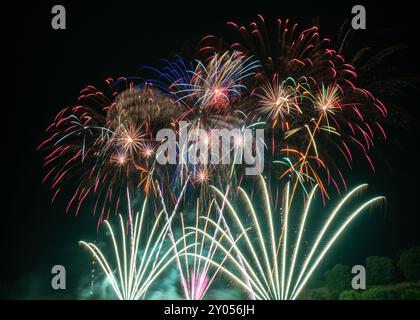 Colorful Fireworks Display against Black Sky Stock Photo