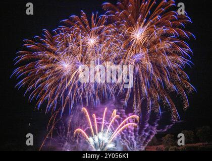 Colorful Fireworks Display against Black Sky Stock Photo