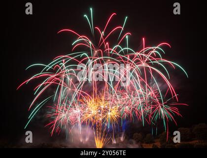 Colorful Fireworks Display against Black Sky Stock Photo