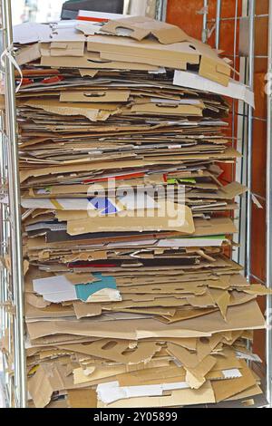 Carboard carton material stacked for recycling Stock Photo