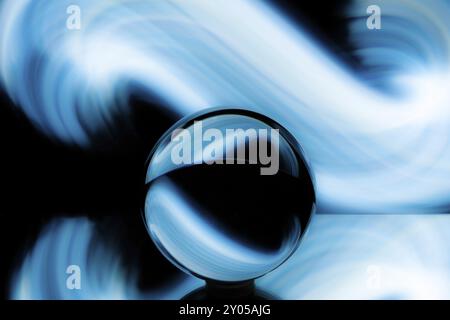 Fascinating light paintings can be created in a completely dark room with the help of just a few utensils. All you need is a mirror on which the glass Stock Photo