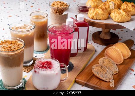 Jolly Pong shake, shake, strawberry latte, latte, rotus latte, black sesame latte, vanilla bean latte, madeleine, butter cones, scones, cafes, coffee, Stock Photo