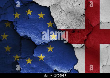 Flags of EU and England painted on cracked wall Stock Photo