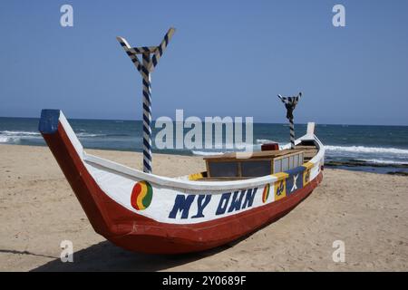 Fishing boat on the beach at Prampram Stock Photo