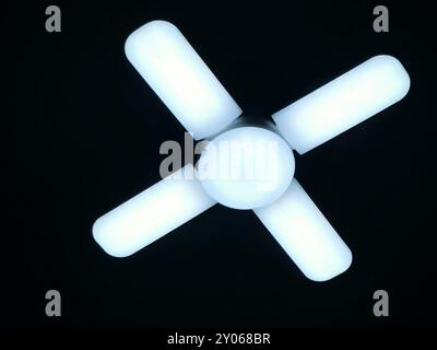 A fan shaped LED lamp, LED light is an electric light that produces light using light-emitting diodes, and more energy-efficient than equivalent incan Stock Photo