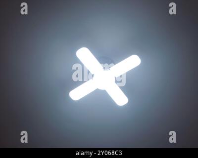 A fan shaped LED lamp, LED light is an electric light that produces light using light-emitting diodes, and more energy-efficient than equivalent incan Stock Photo