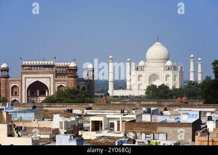 The Taj Mahal and the taj ganj neighborhood's rooftops are seen from a distance Stock Photo