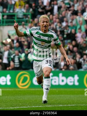 Celtic's Daizen Maeda (L) celebrates after scoring in the first half of ...