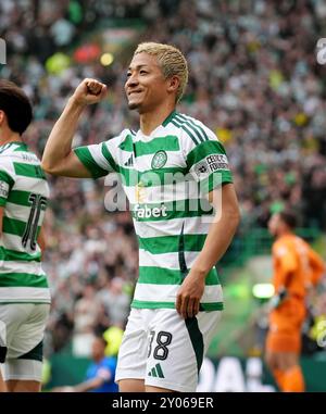 Celtic's Daizen Maeda (L) celebrates after scoring in the first half of ...