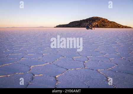 Salar Uyuni, BOLIVIA in September 2015: The sun rises over worlds largest salt lake Salar de Uyuni. Southwestern Bolivia is well-known for dramatic la Stock Photo