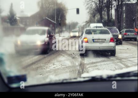 View through the windscreen of a car turning left at a junction Stock Photo