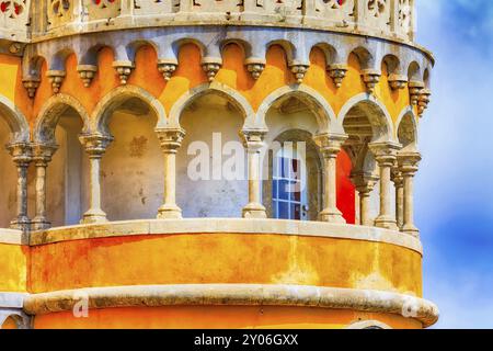 Sintra, Portugal landmark, yellow tower archs in Pena Palace close-up detail view Stock Photo