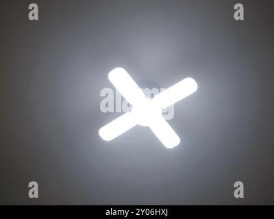 A fan shaped LED lamp, LED light is an electric light that produces light using light-emitting diodes, and more energy-efficient than equivalent incan Stock Photo