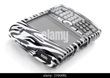 BlackBerry 8310 Curve Smartphone in a fancy stripy zebra cover Isolated on white background Stock Photo