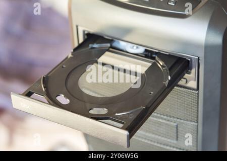 PC case with built-in DVD drive with an open blank disc tray Stock Photo
