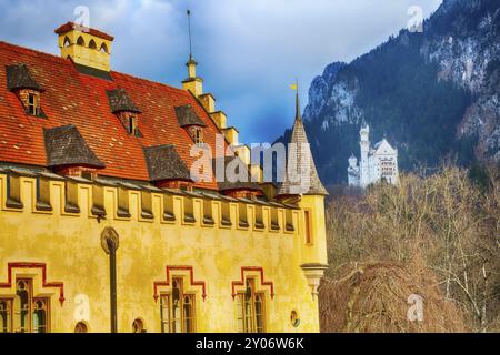 Neuschwanstein and details of Hohenschwangau Castle in Germany, Bavaria, mountains view Stock Photo