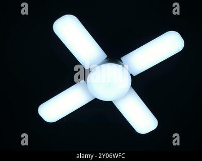 A fan shaped LED lamp, LED light is an electric light that produces light using light-emitting diodes, and more energy-efficient than equivalent incan Stock Photo