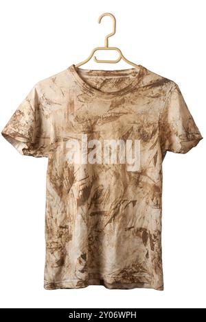 soiled dirty or muddy white t shirt isolated white background, stained and discolored cotton dress cloth with brown streaks or blotches of mud dirt Stock Photo