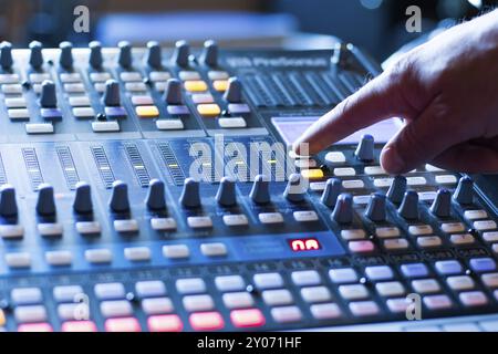 Professional music production in a sound recording studio, mixer desk Stock Photo