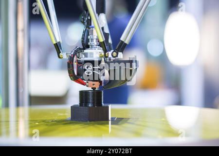 Automatic 3d printer performs a three-dimensional product creation, close-up Stock Photo