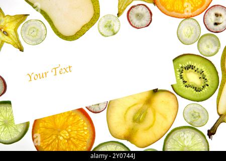 Slices of fresh kiwi, orange, kiwano, grapes and citrus fruit Stock Photo