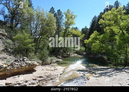 Cascade & Rocks of the Trou des Rauques on the Lauzon River Montlaux Alpes-de-Haute-Provence Provence France Stock Photo