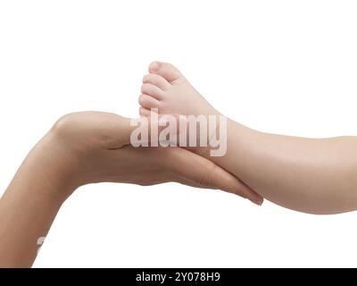 Mother holding her three month old baby sons foot in her hands. Isolated on white background with a clipping path Stock Photo