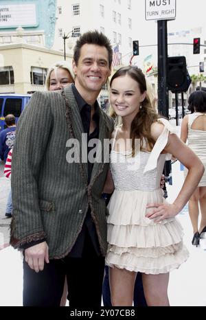 HOLLYWOOD, CA, JUNE 12, 2011: Jim Carrey and Madeline Carroll at the Los Angeles premiere of 'Mr. Popper's Penguins' held at the Grauman's Chinese The Stock Photo