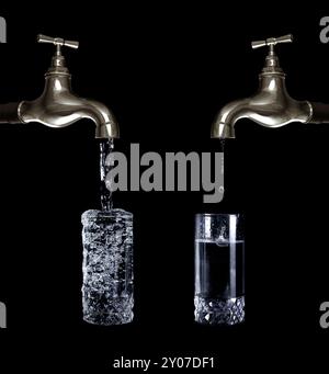 Water running from taps into glasses. One of the taps has run out of water and dripping. Water economy, ecology, environmental conceptual photo-illust Stock Photo