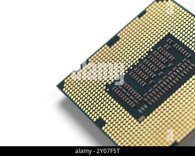 Intel i7 processor gold contacts CPU socket circuit isolated on white background Stock Photo