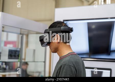 Man wearing 3-D glasses. Hanover Fair, Hanover, Lower Saxony, Germany, Europe Stock Photo