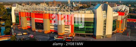 Panoramic image of Sir Alex Ferguson stand entrance of Manchester United Football stadium in Manchester Stock Photo