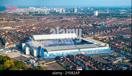 An aerial view of Goodison Park, Everton's home stadium, with the city of Liverpool in the background. Stock Photo