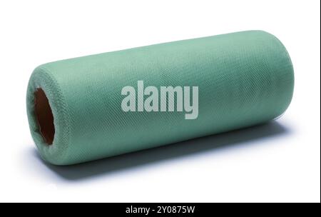 Green Fabric Roll Cut Out on White. Stock Photo